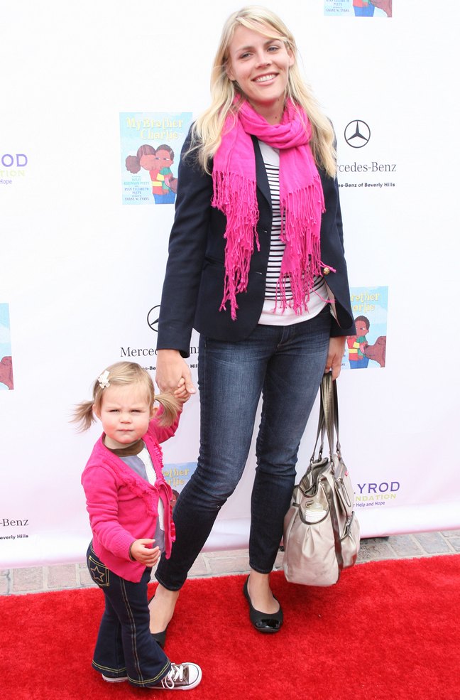 Busy Philipps, pink scarf, black flats, denim jeans, blazer, jacket, white bag, striped black and white top